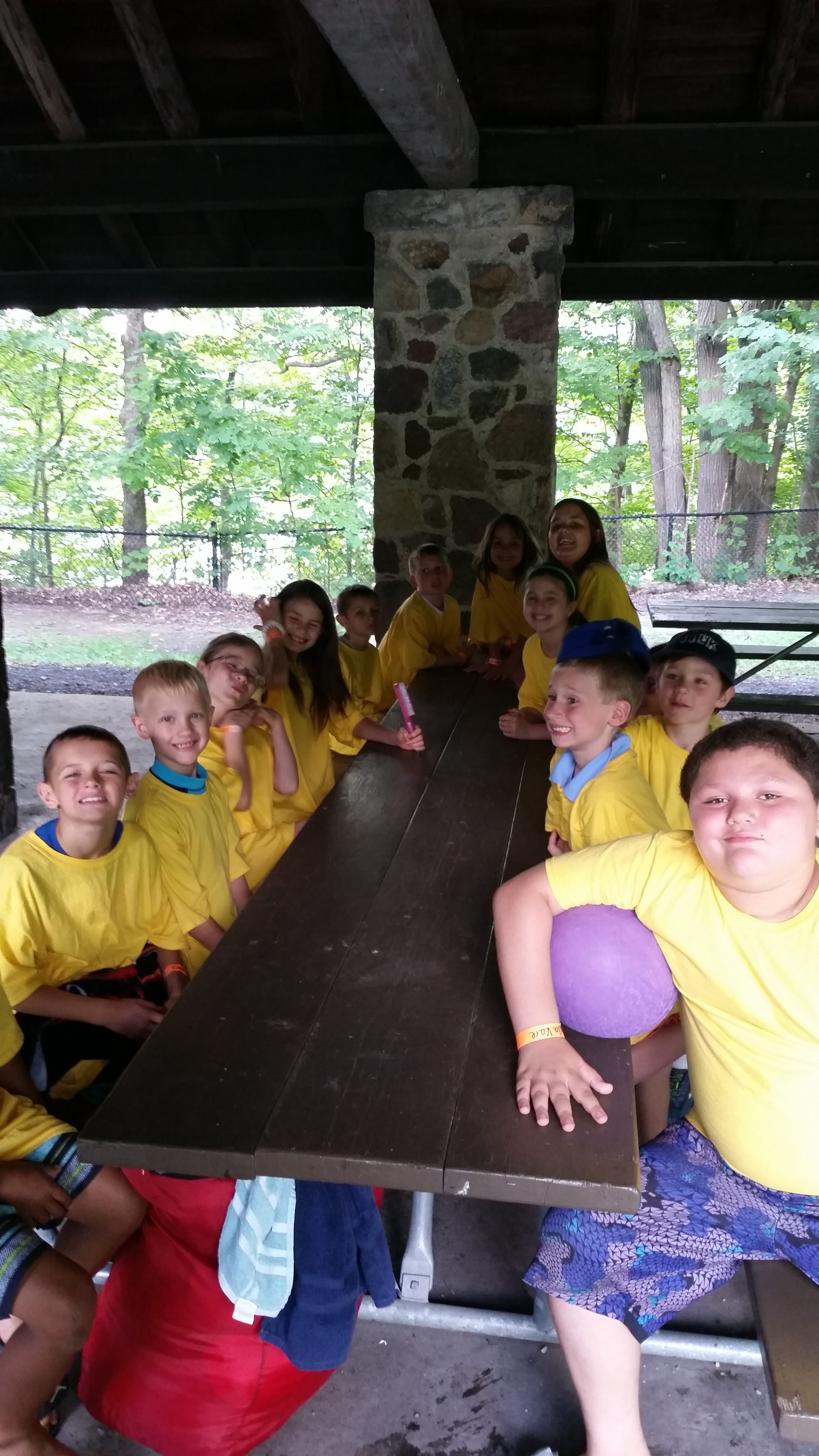 A group of children sitting at the table